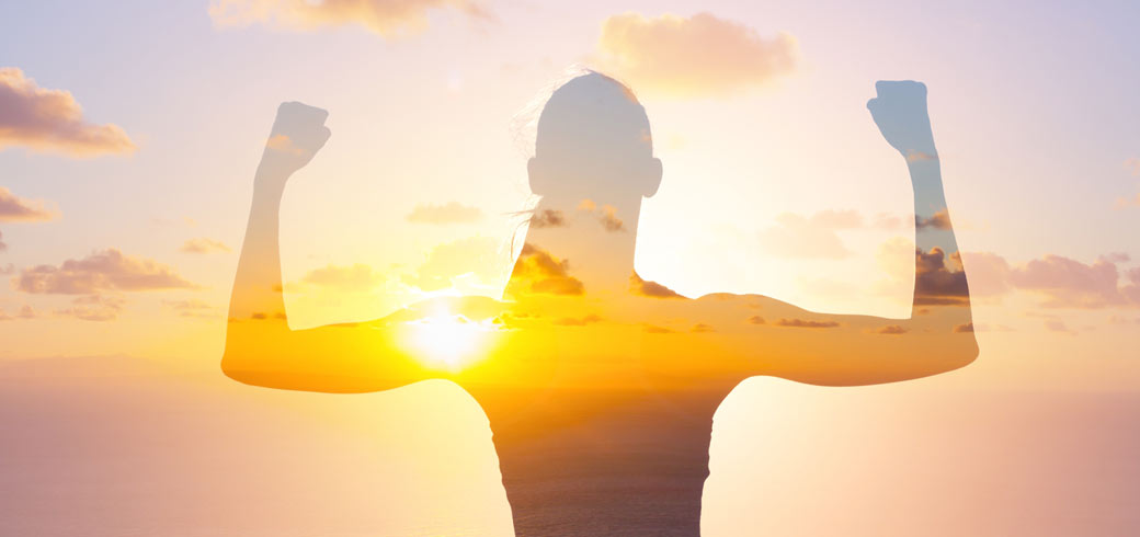 Outline of woman facing the new day
