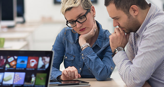 Couple working together in a business setting