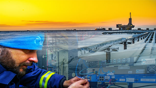 An Alaska Communications field technician attends to equipment supporting oil field operations in Alaska's North Slope.