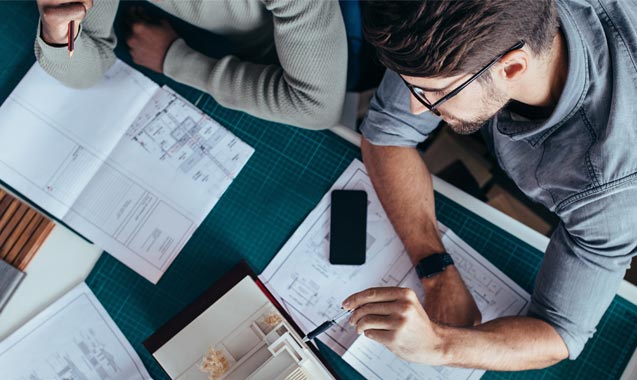 Architects collaborating to solve a design problem