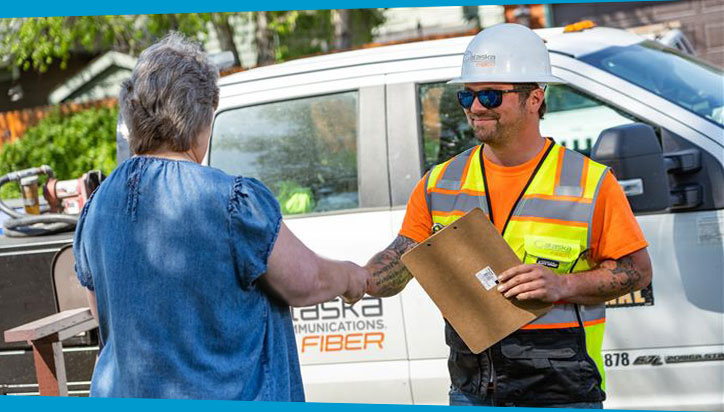 Construction foreman meeting with a community resident